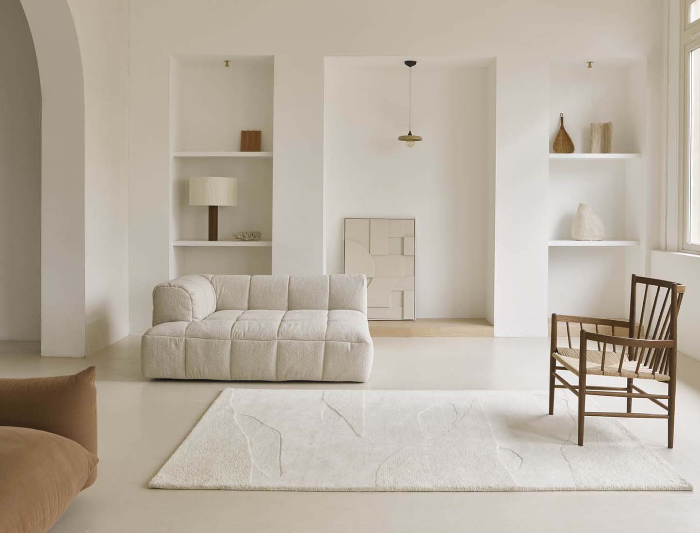 cream wool area rug with subtle texture detail