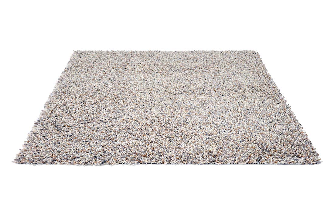 grey and beige shagpile area rug