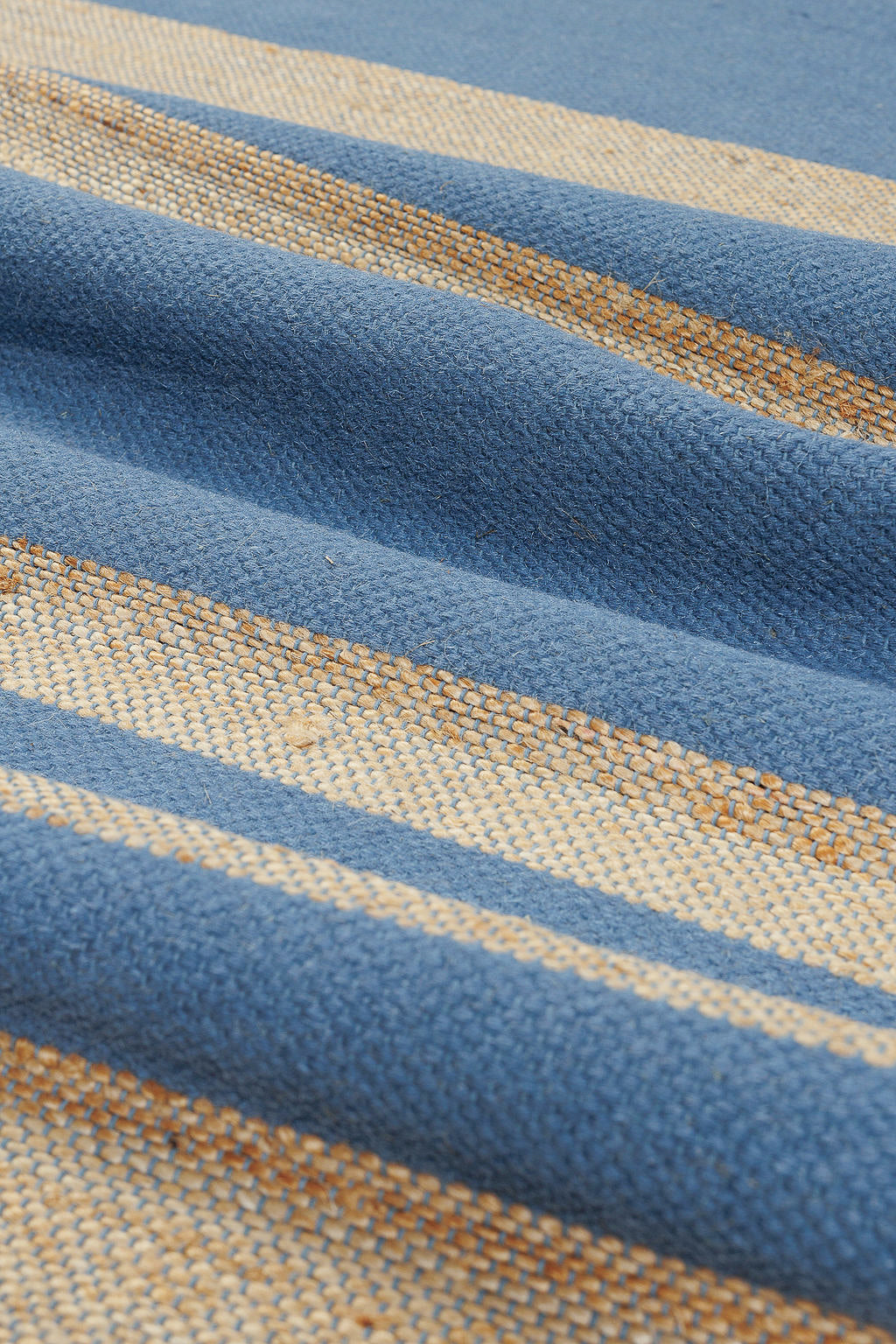 Jute rug with blue stripes
