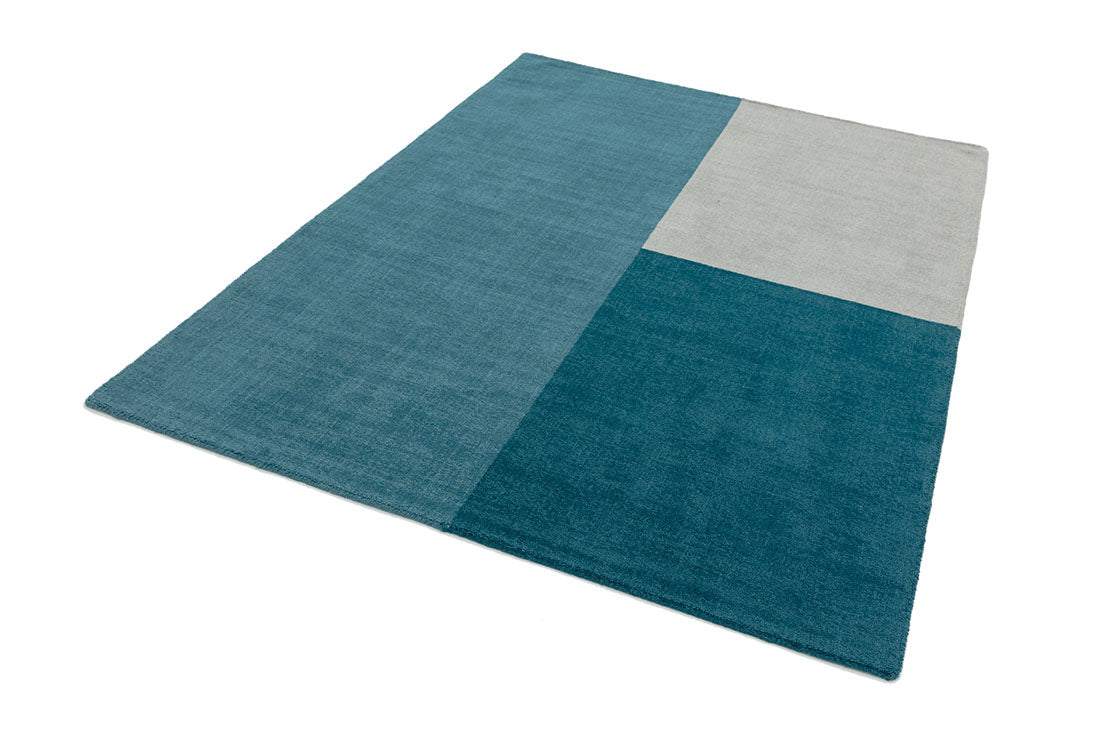 teal blue geometric rug