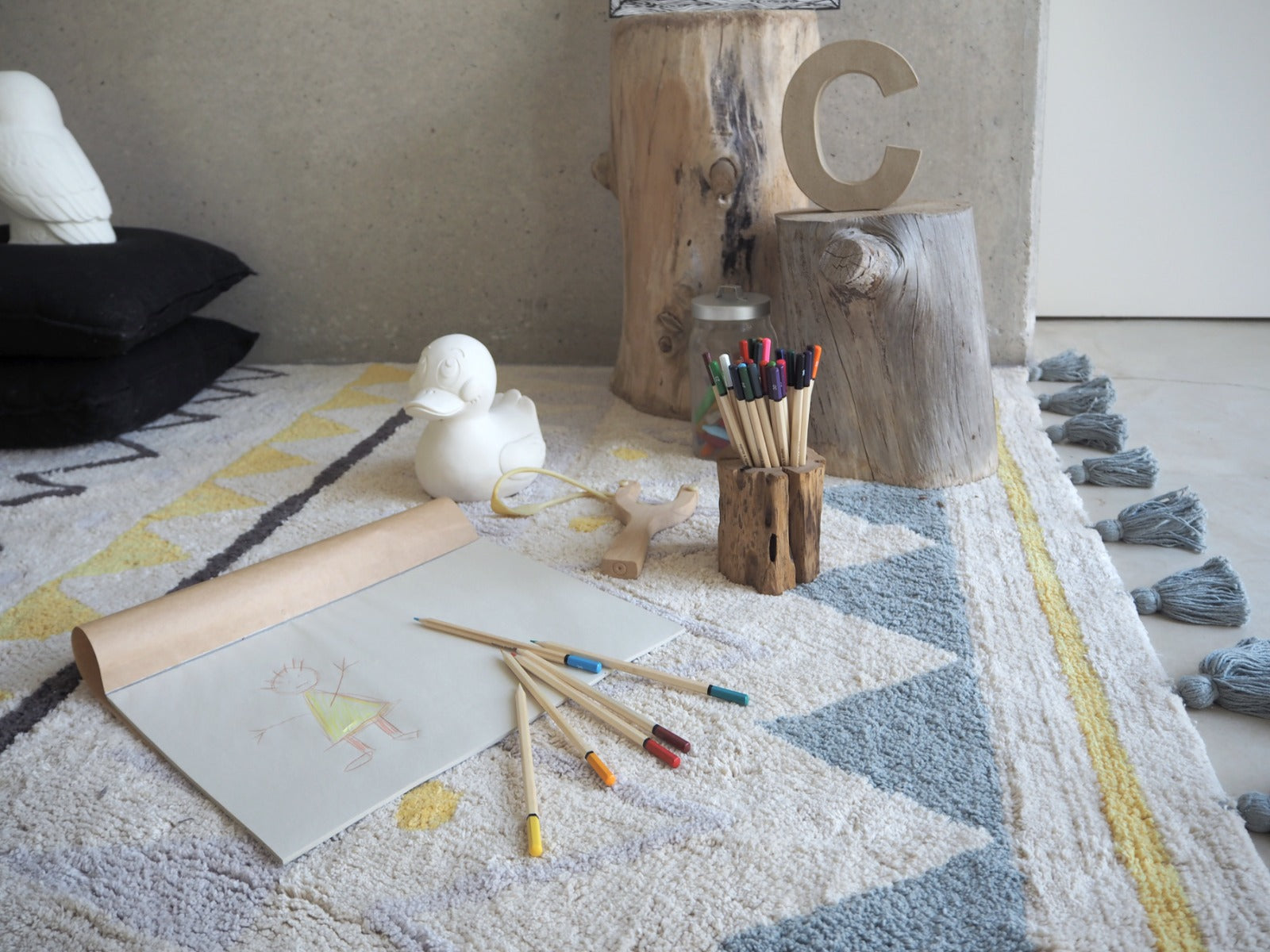 yellow and grey aztec pattern and pink tassel border