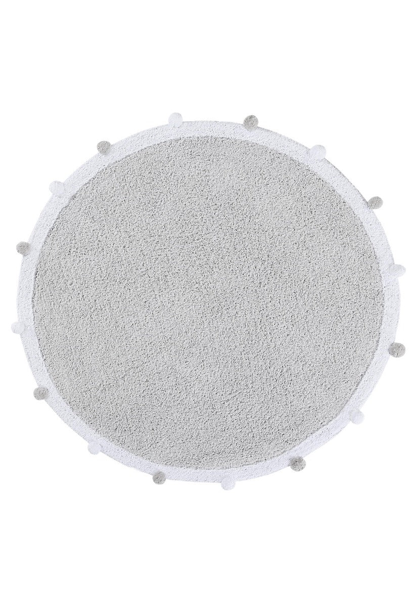 Circular grey pom pom rug with grey and white pom pom border