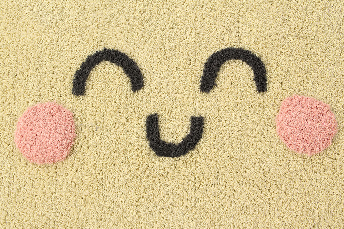 cotton tufted round rug shaped as a smiling sun