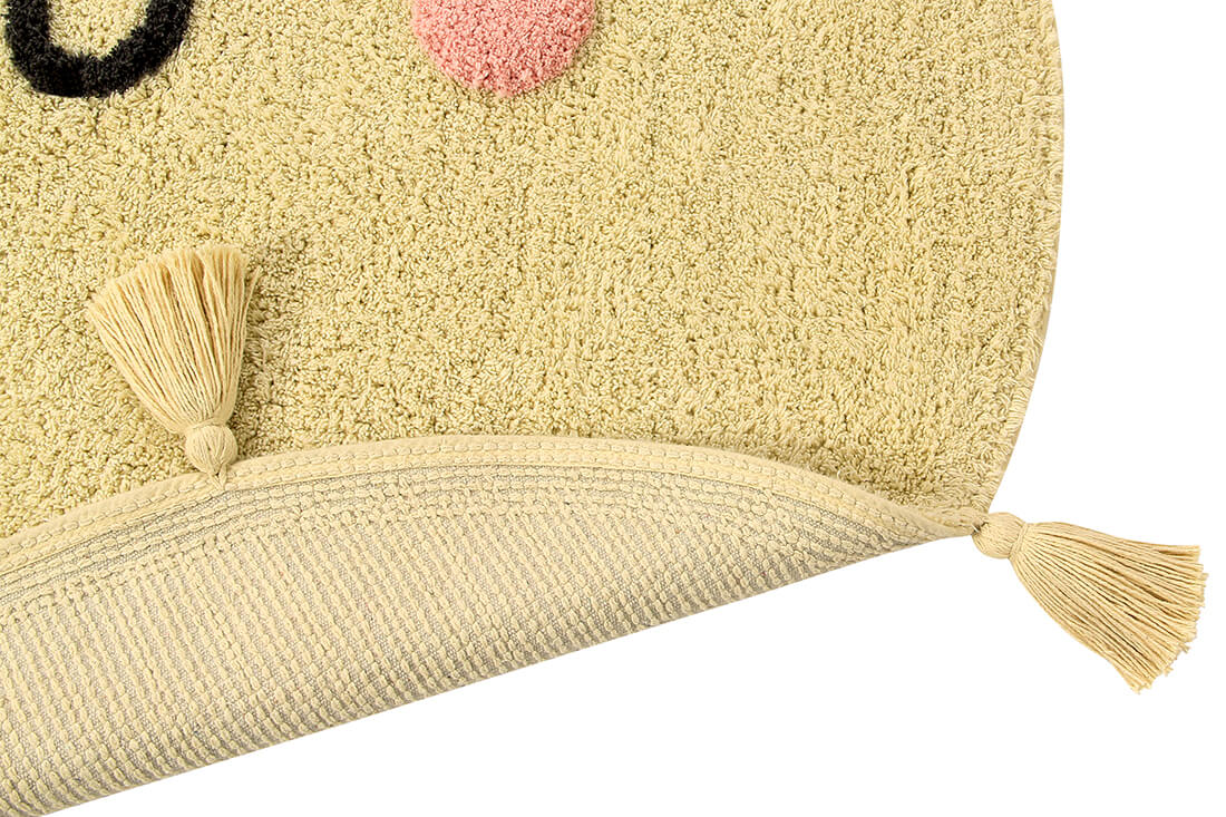 cotton tufted round rug shaped as a smiling sun