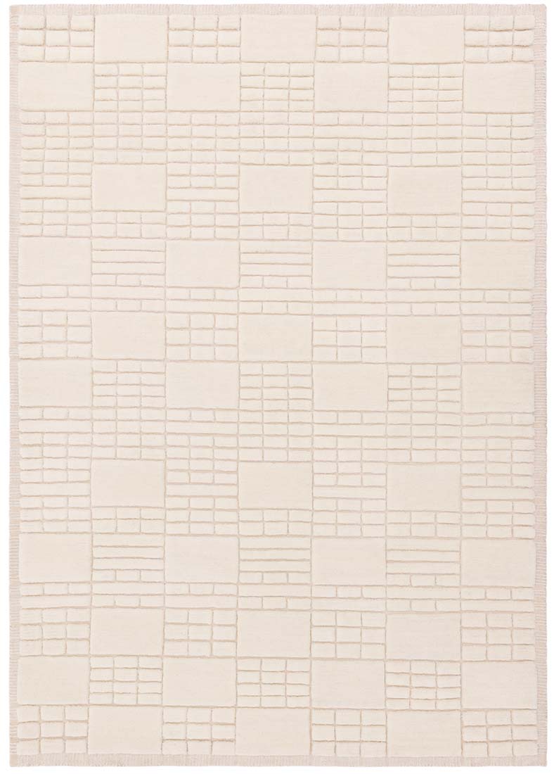 cream wool rug with subtle geometric pattern