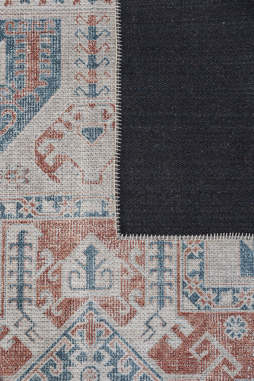 Blue and red bordered vintage style rug