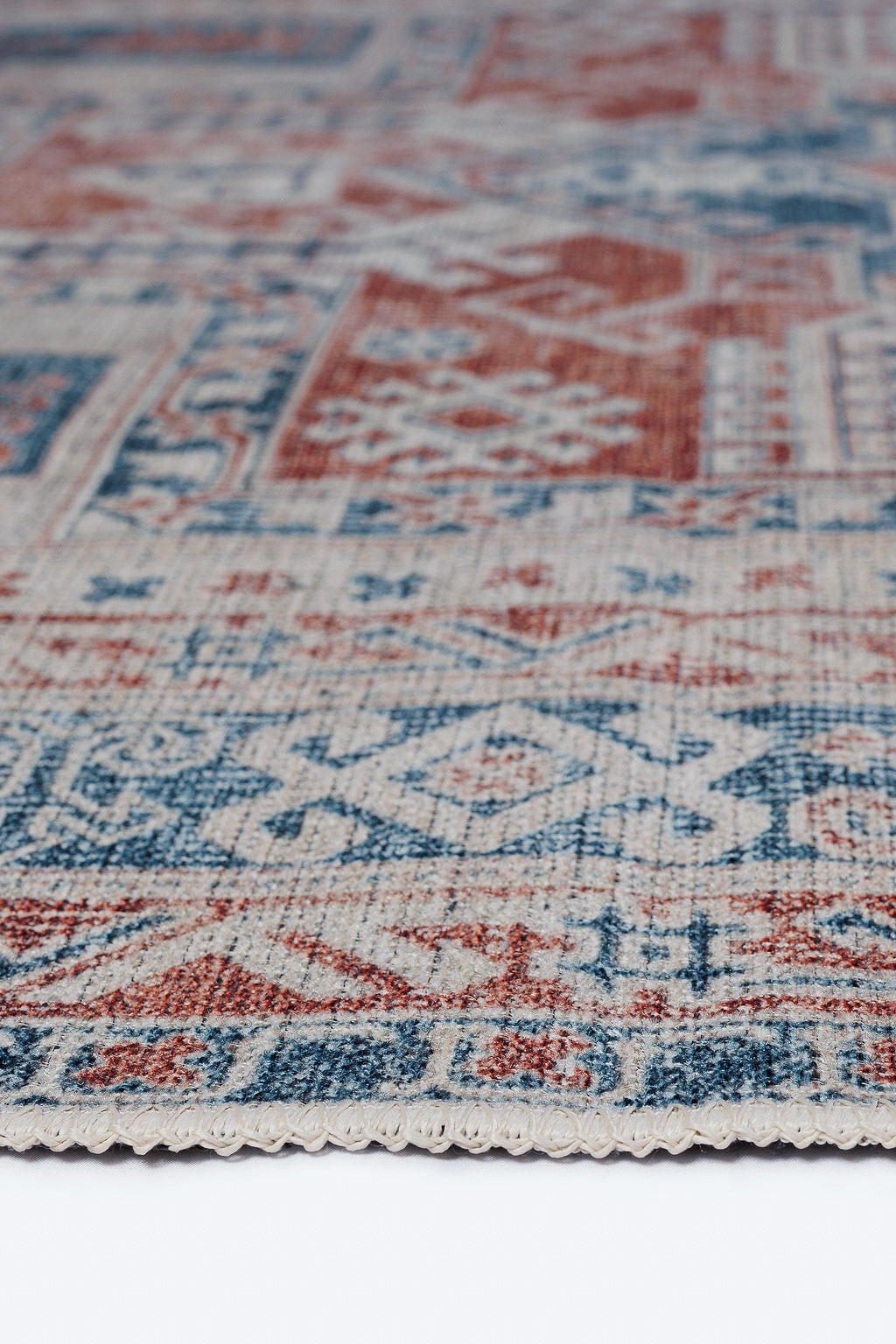 Blue and red bordered vintage style rug