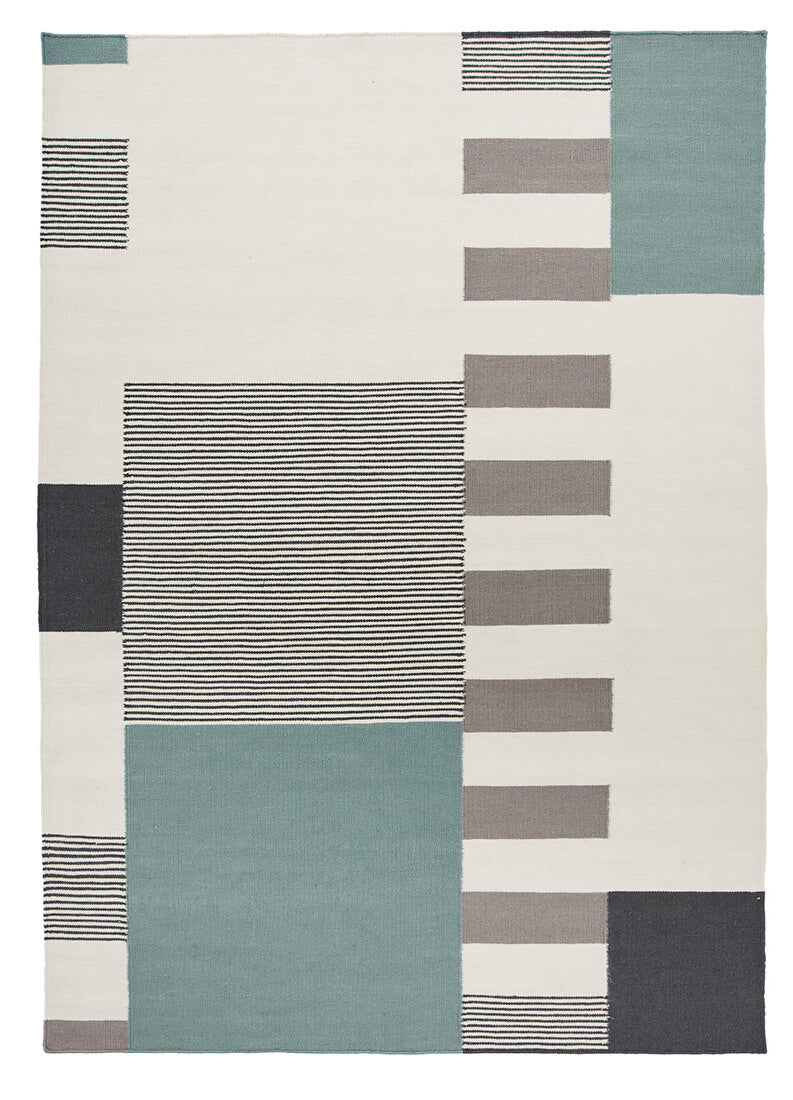 geometric wool rug with green design
