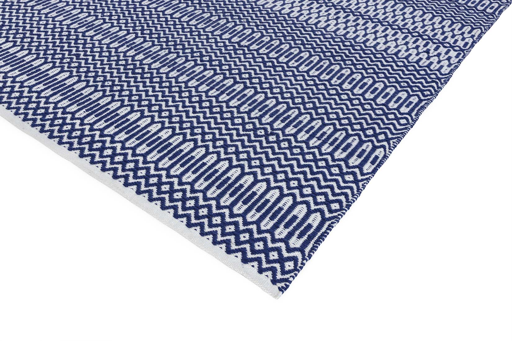 blue indoor/outdoor rug with geometric design