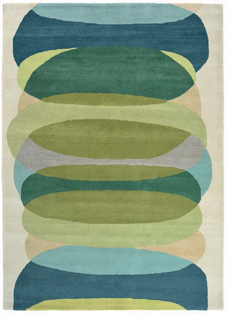 green wool rug with astract design