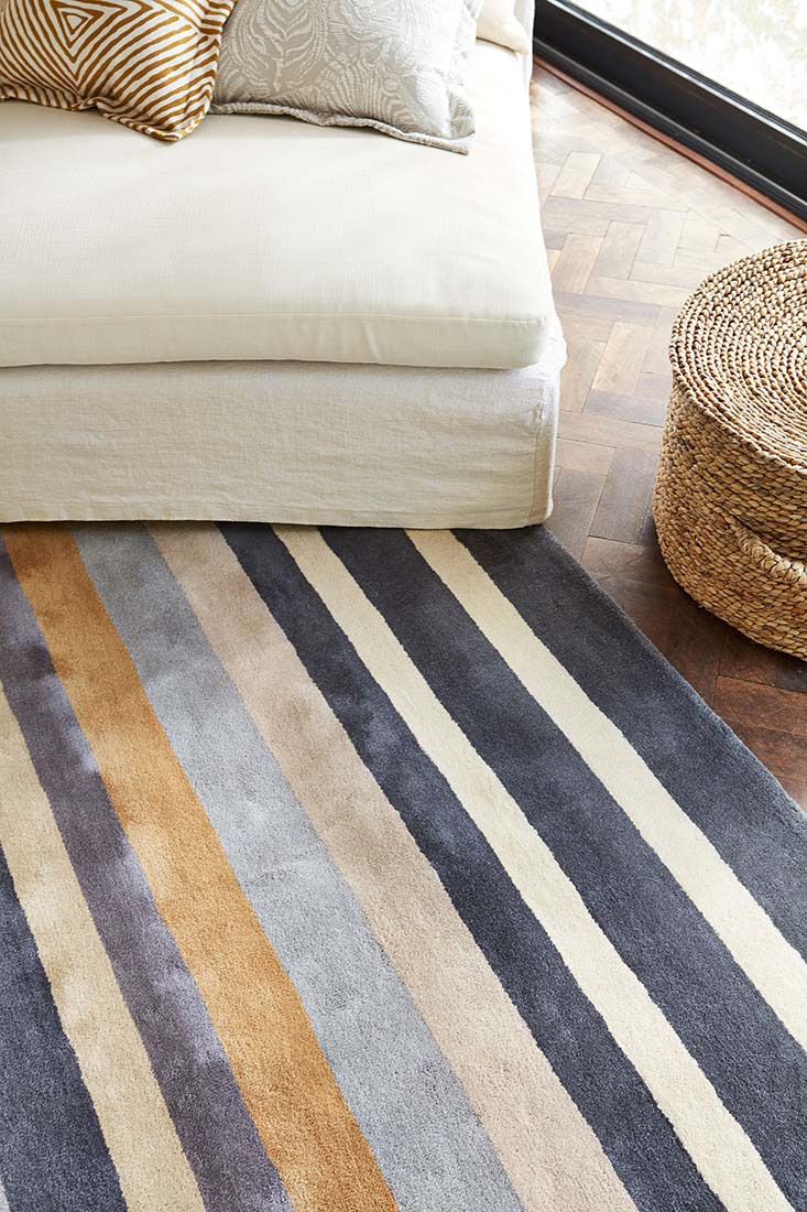 wool rug with blue stripe design