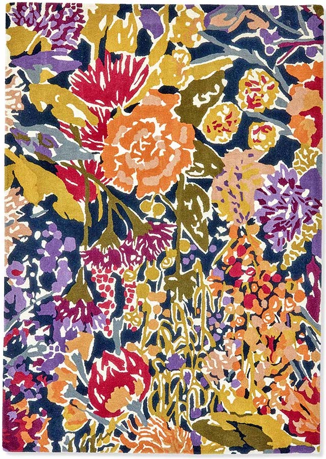 floral rug in orange, purple, green and blue