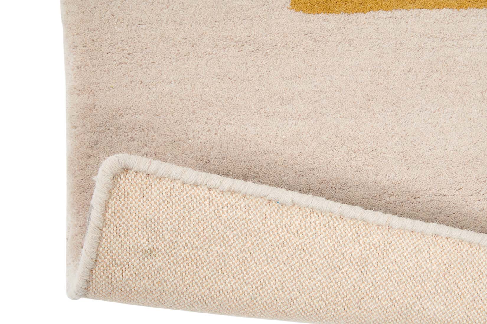 Rectangular white wool rug with pink, yellow, purple and green flowers and leaves