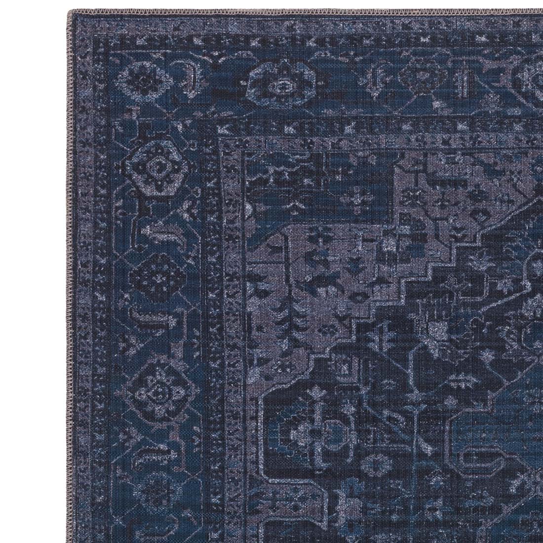 blue Persian inspired area rug 
