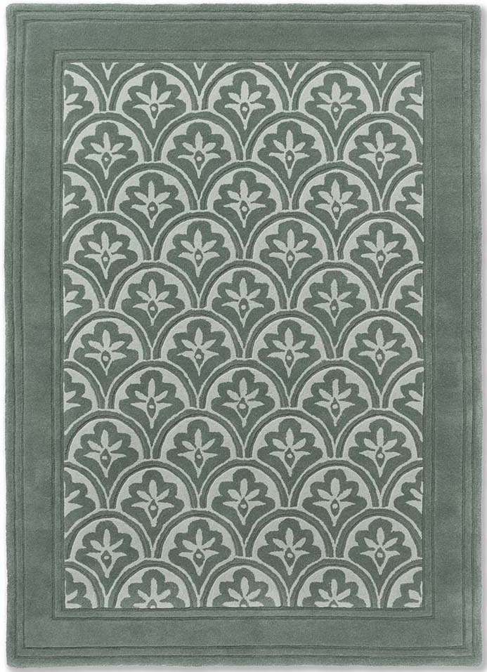 Modern dark green wool rug with leaf motif