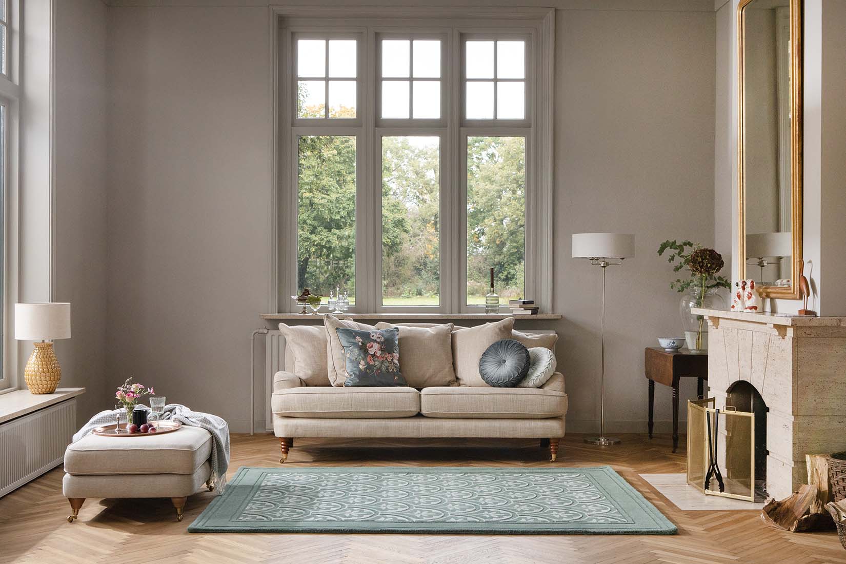 Modern dark green wool rug with leaf motif