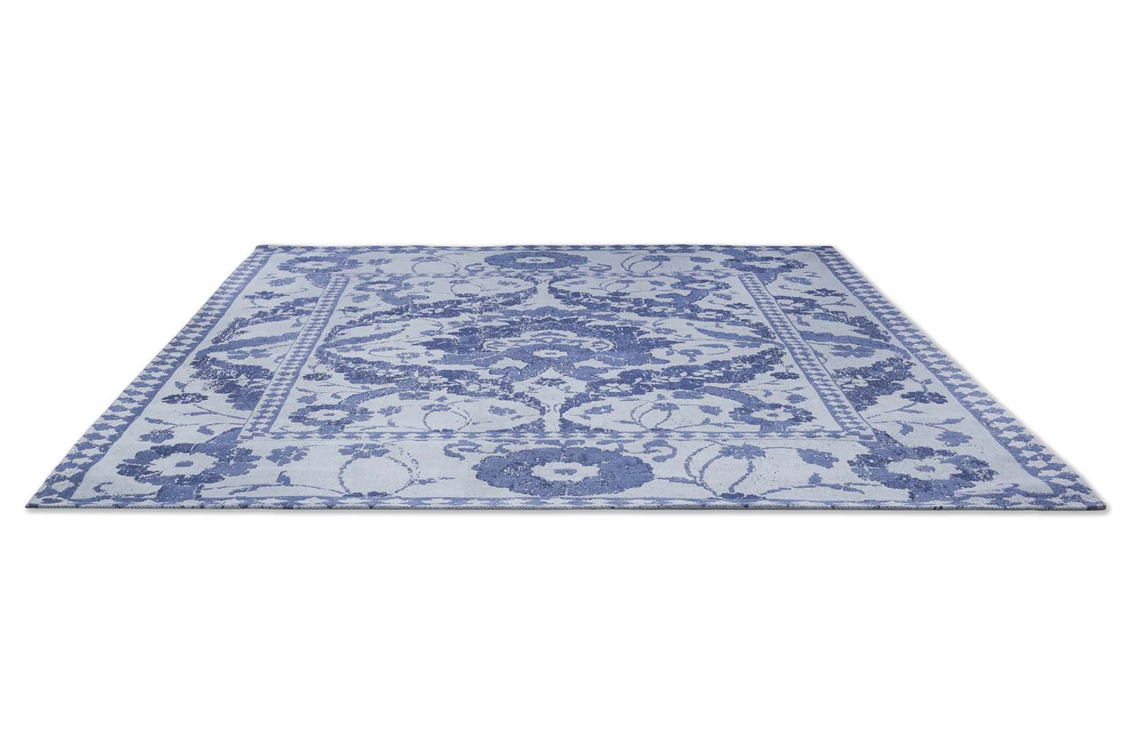Vintage floral style cotton blue rug
