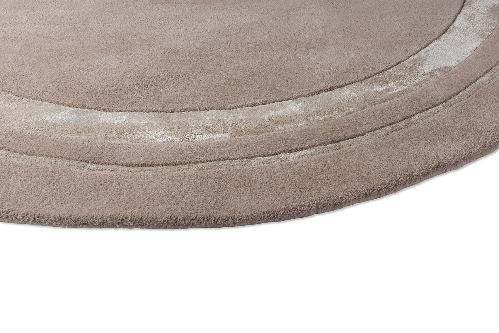 Plain brown wool and viscose circle rug 
