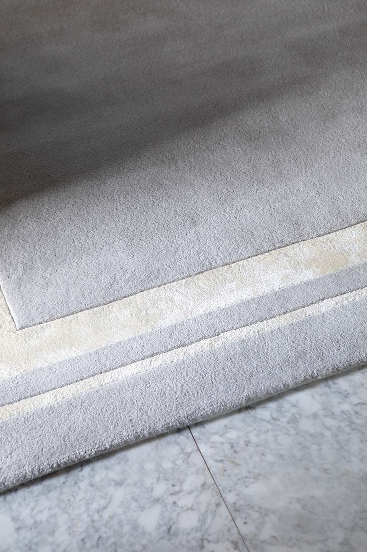 Plain grey and silver wool and viscose rug