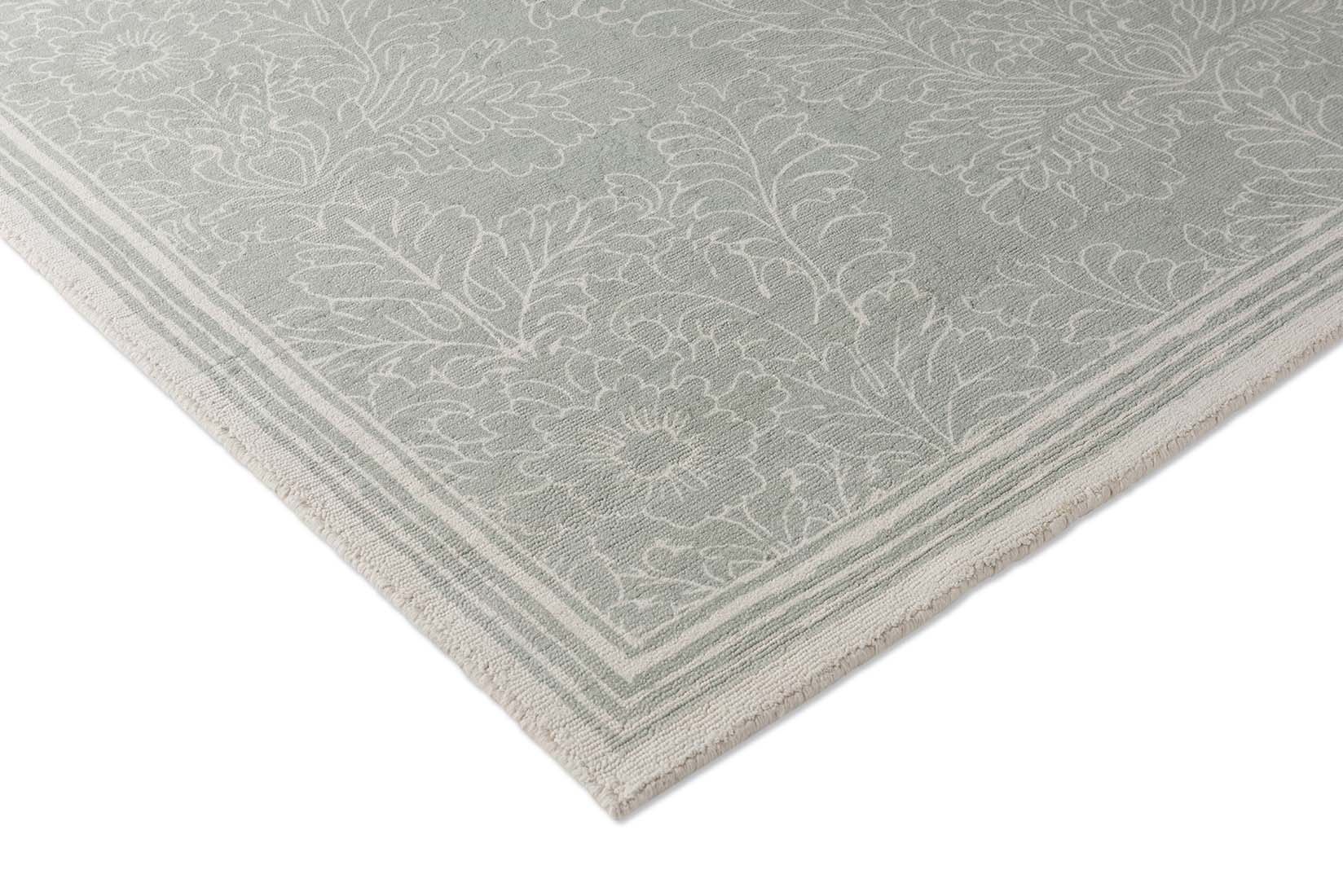 Green cotton rug in damask pattern