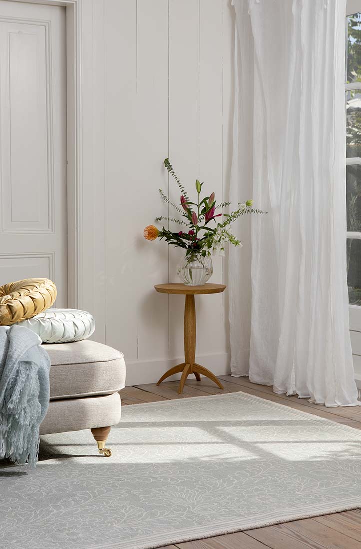 Green cotton rug in damask pattern