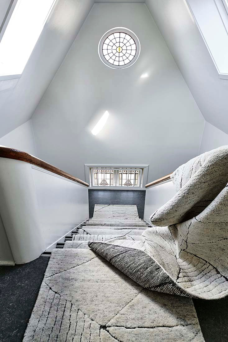 Cream area rug with abstract design