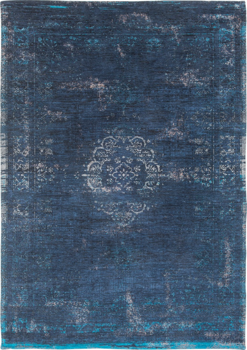Blue flatweave rug with faded persian design