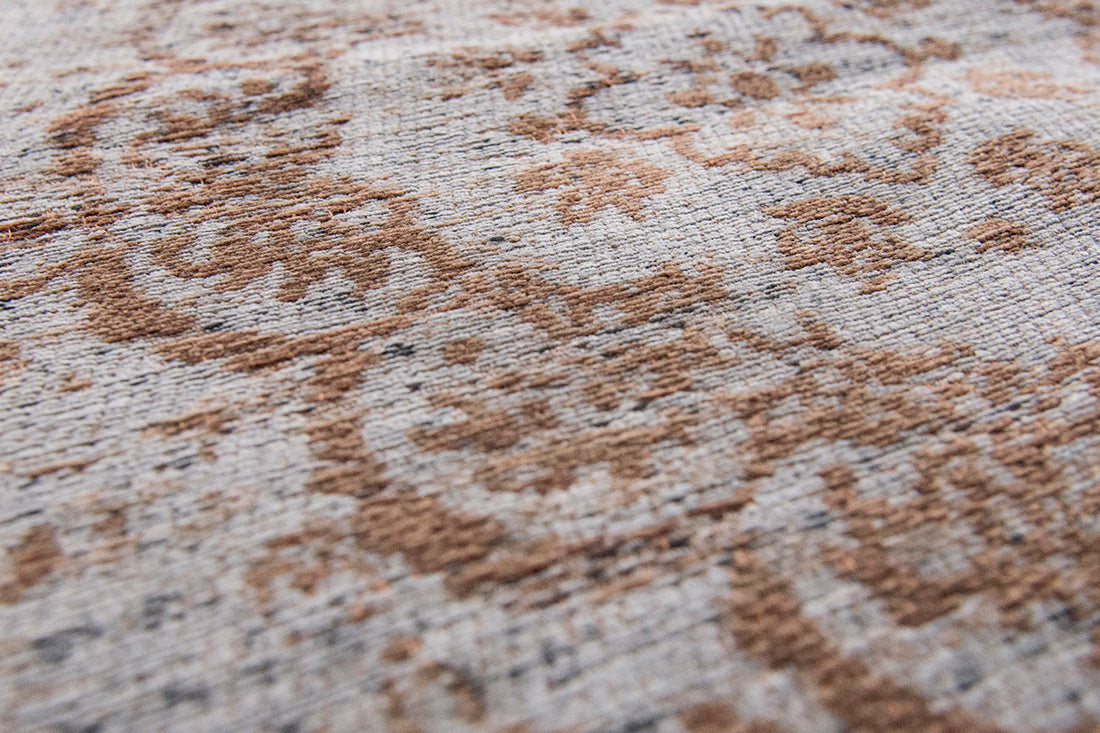 Grey and brown flatweave rug with faded persian medallion pattern