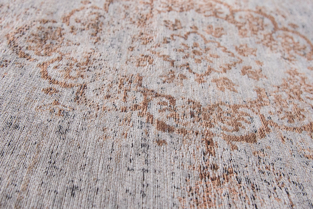 Grey and brown flatweave rug with faded persian medallion pattern