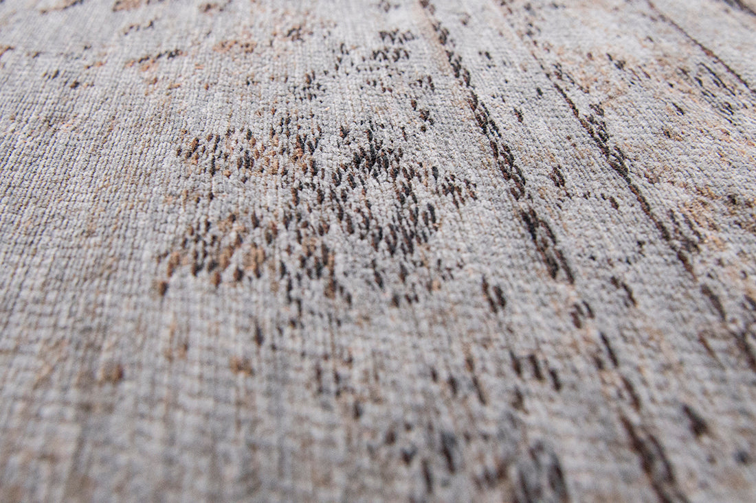 Grey and brown flatweave rug with faded persian medallion pattern