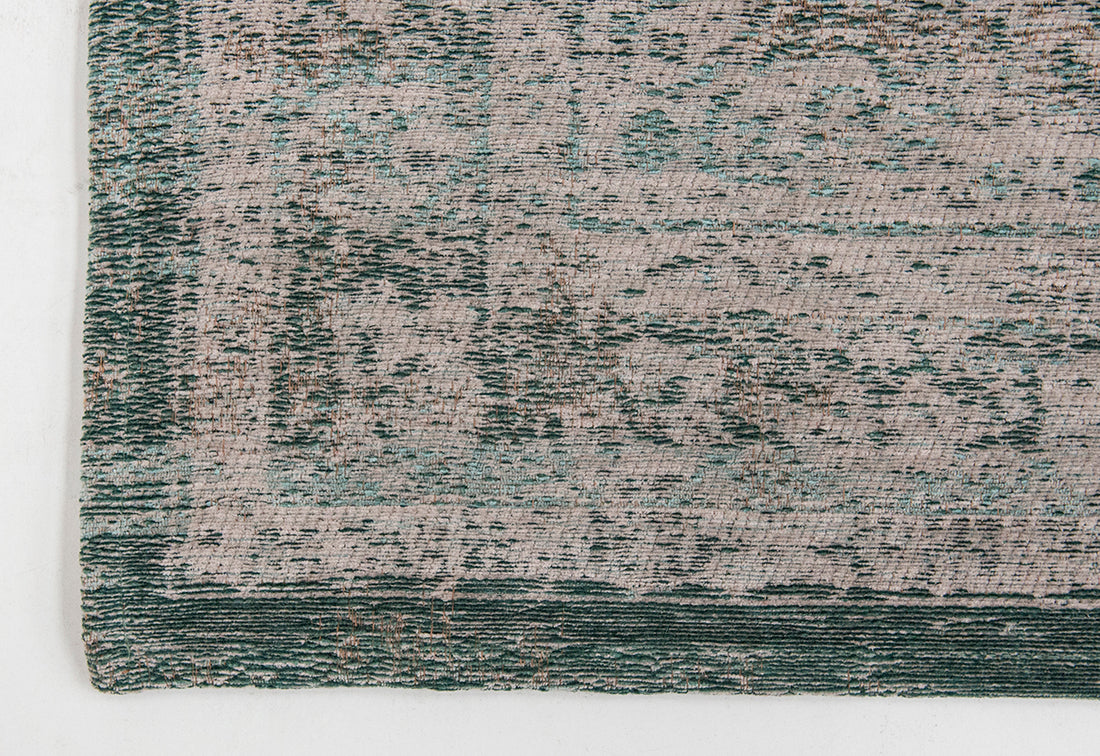 Grey flatweave rug with faded green persian design
