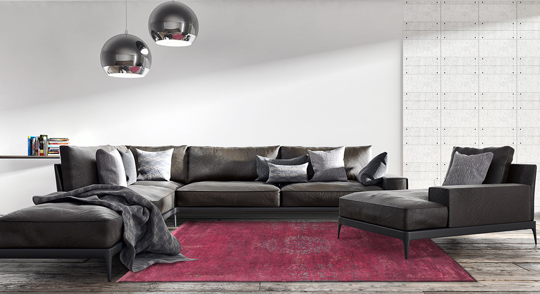 Red rug with faded persian design