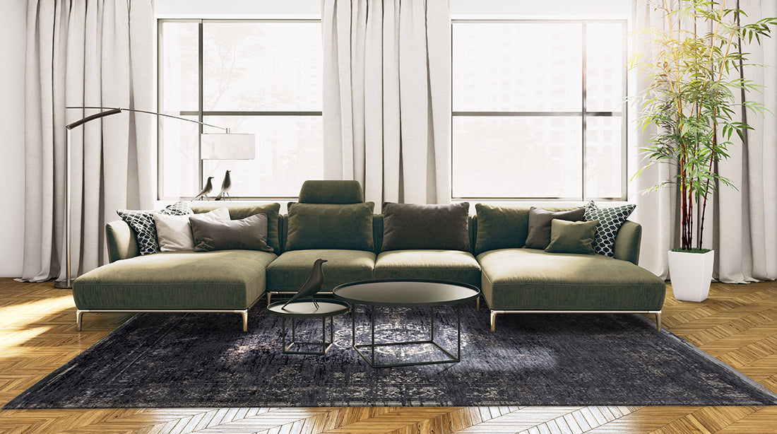 Black flatweave rug with faded persian design