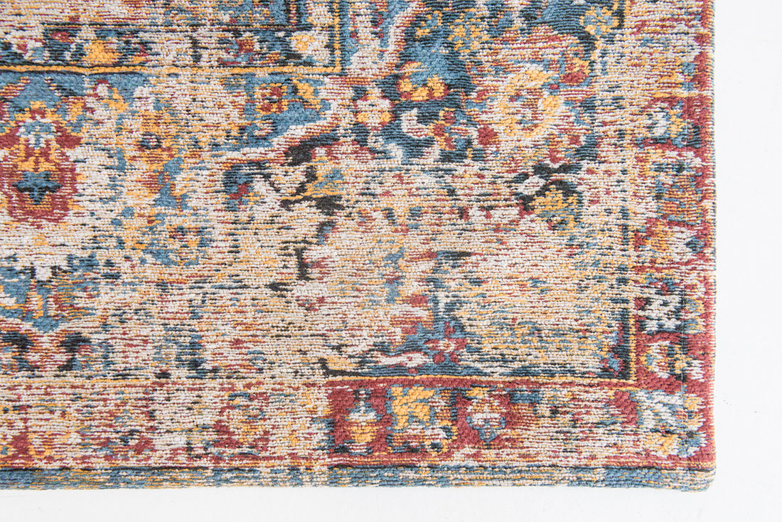 Flatweave rug with faded persian design in blue