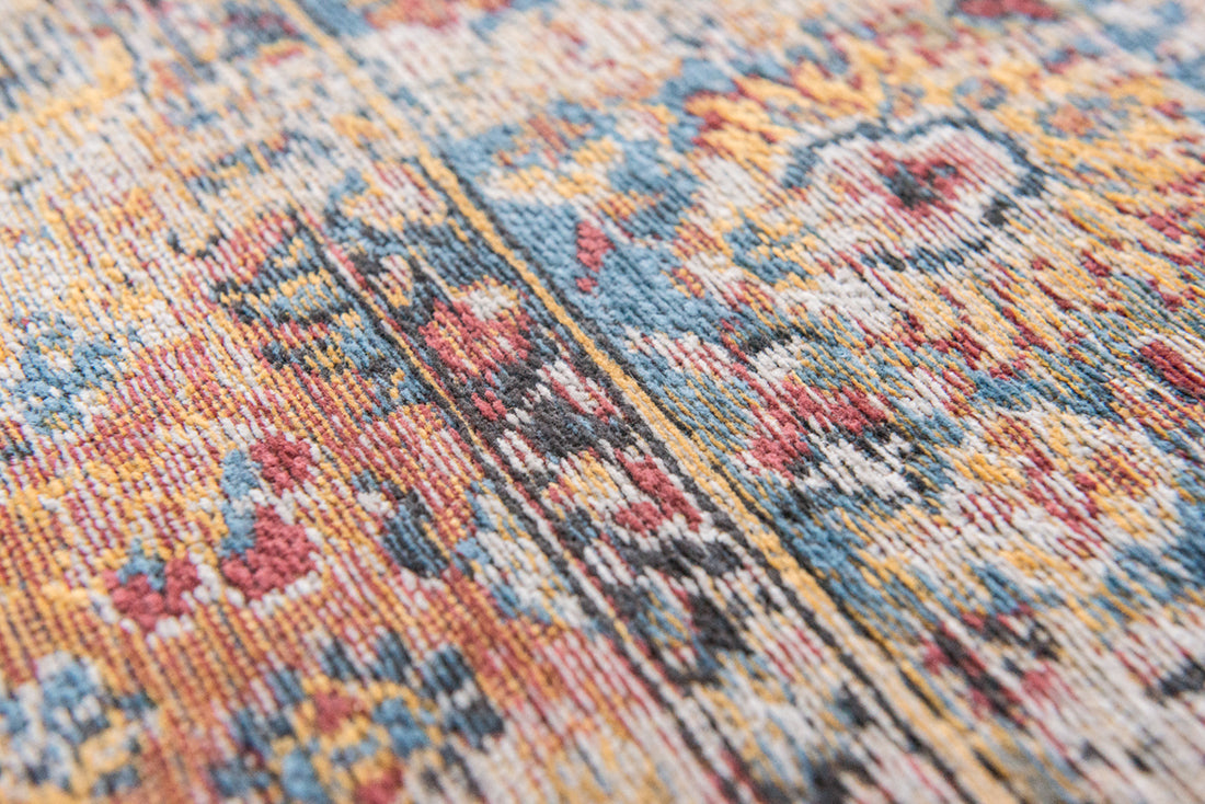 Flatweave rug with faded persian design in blue