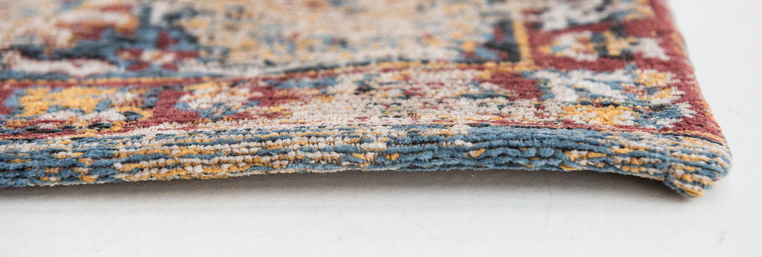 Flatweave rug with faded persian design in blue