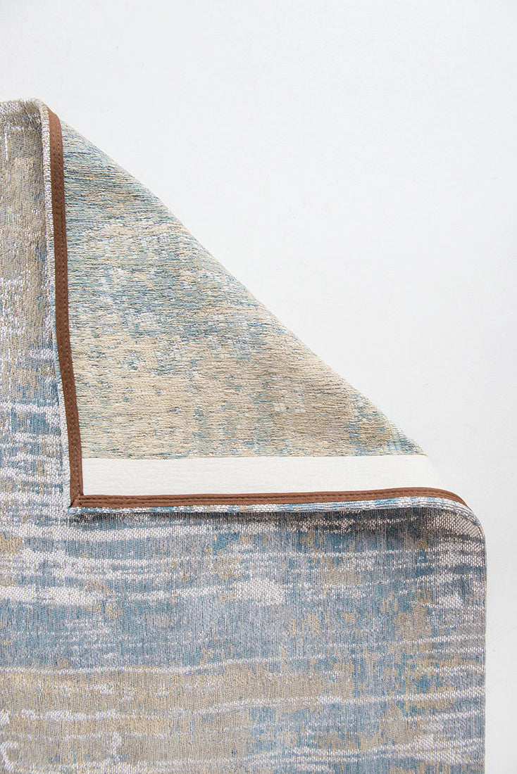 Flatweave rug with abstract stripe design in blue