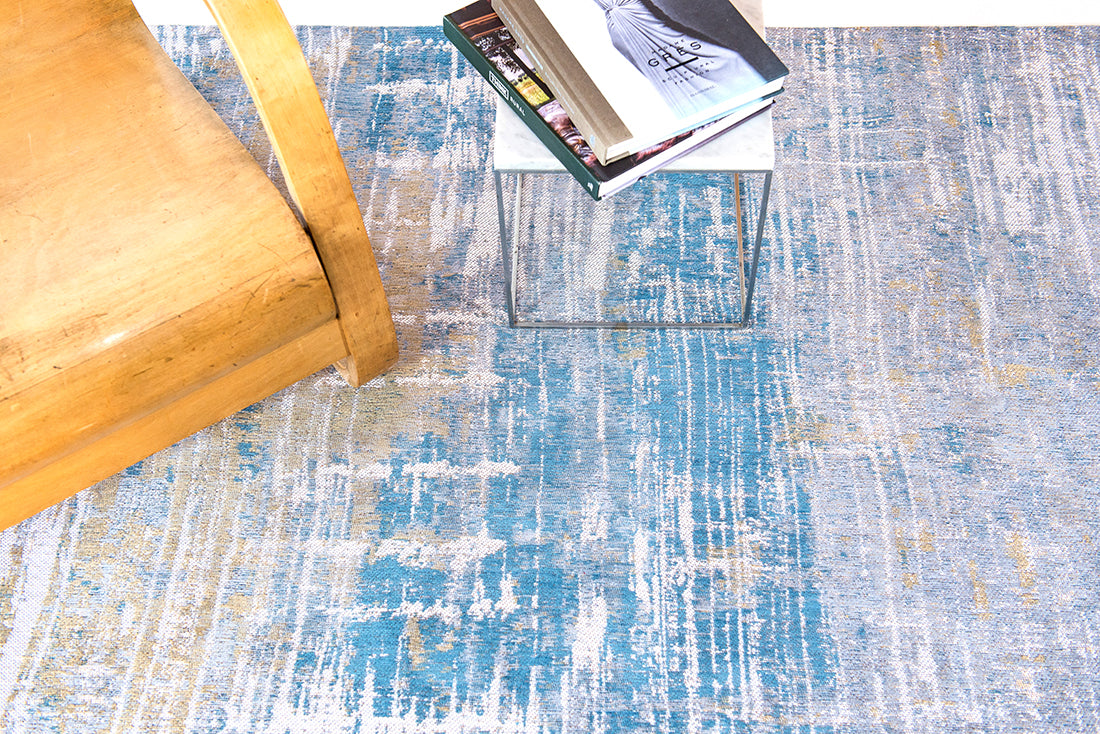 Flatweave rug with abstract stripe design in blue