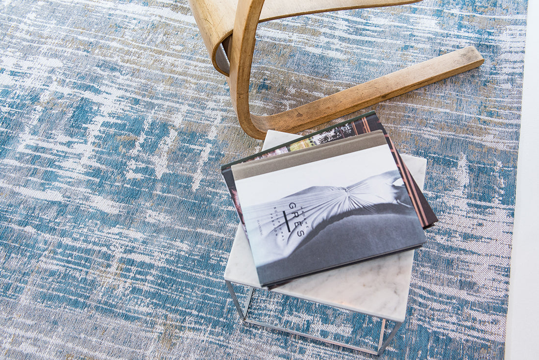 Flatweave rug with abstract stripe design in blue