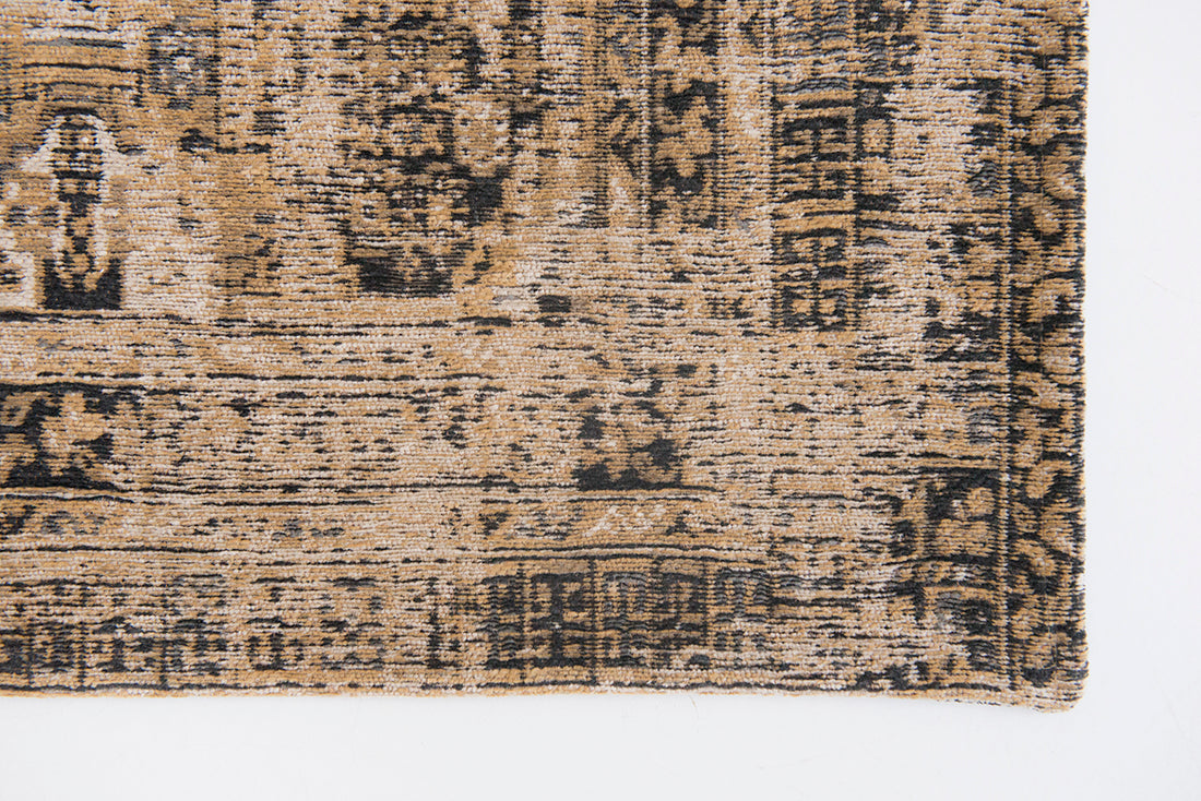 Gold and beige flatweave rug with faded persian design of floral motifs and gul medallions