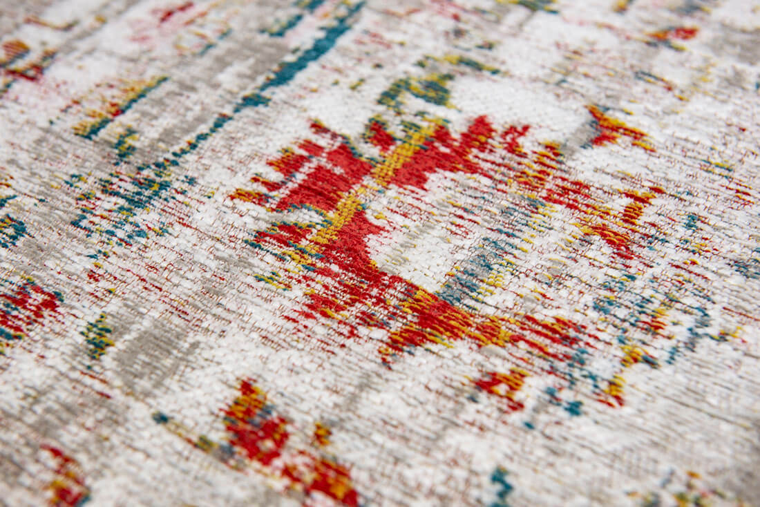 Distressed beige rug with turkish floral medallions and border in teal