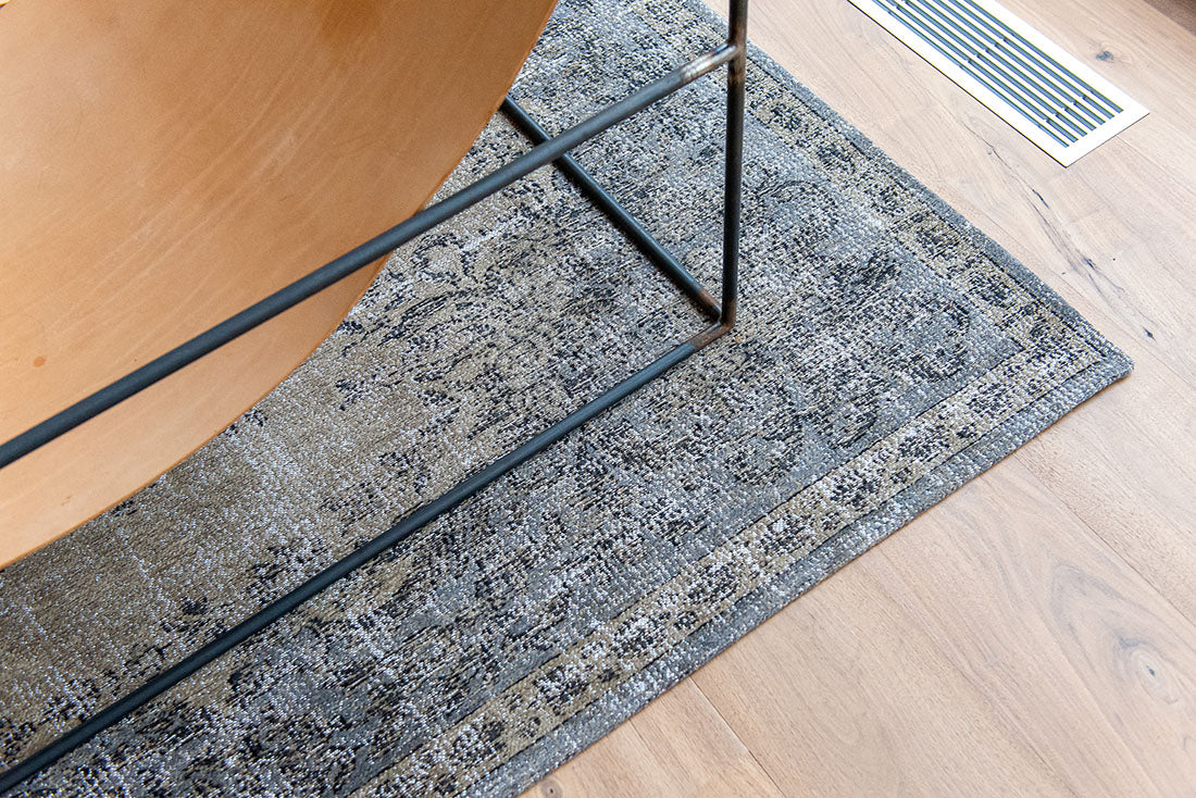 taupe brown vintage style rug with a traditional design