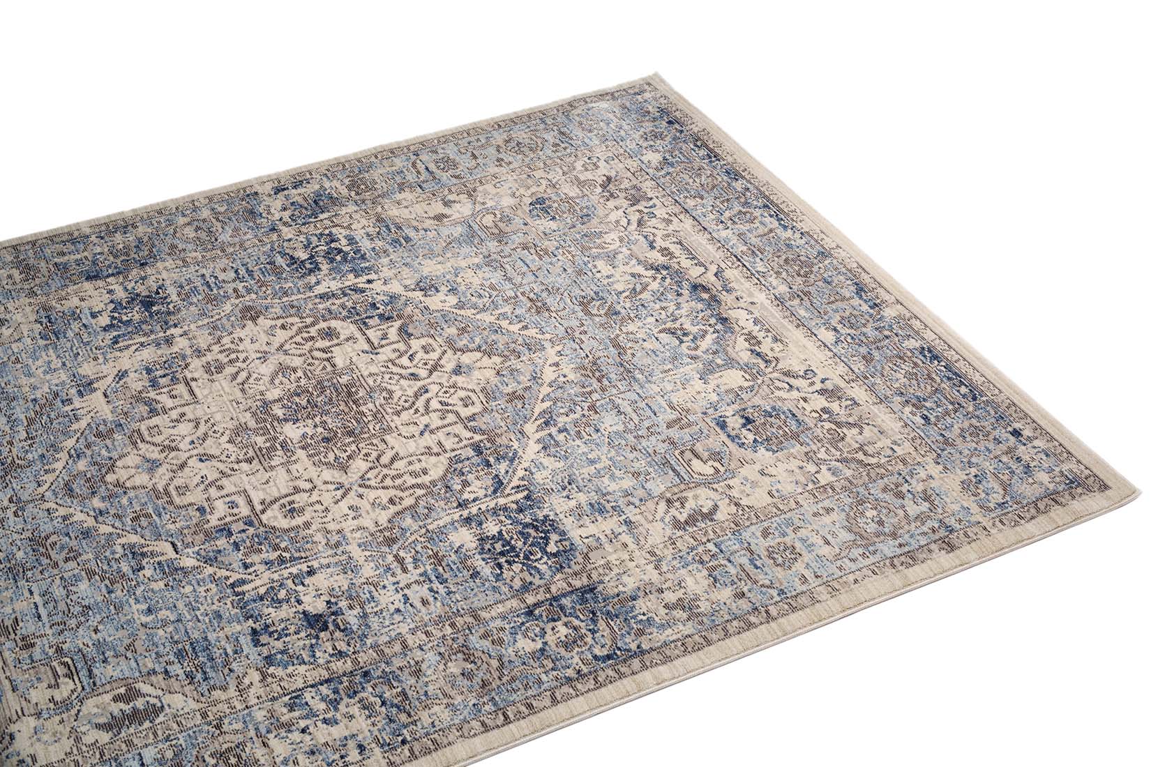 Persian style area rug in blue and grey