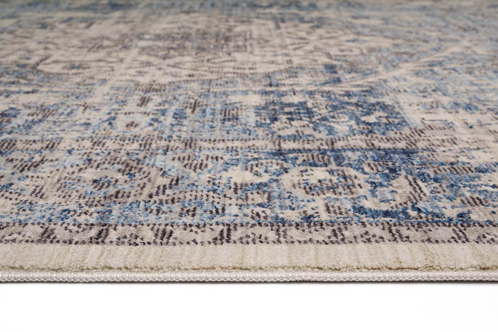 Persian style area rug in blue and grey