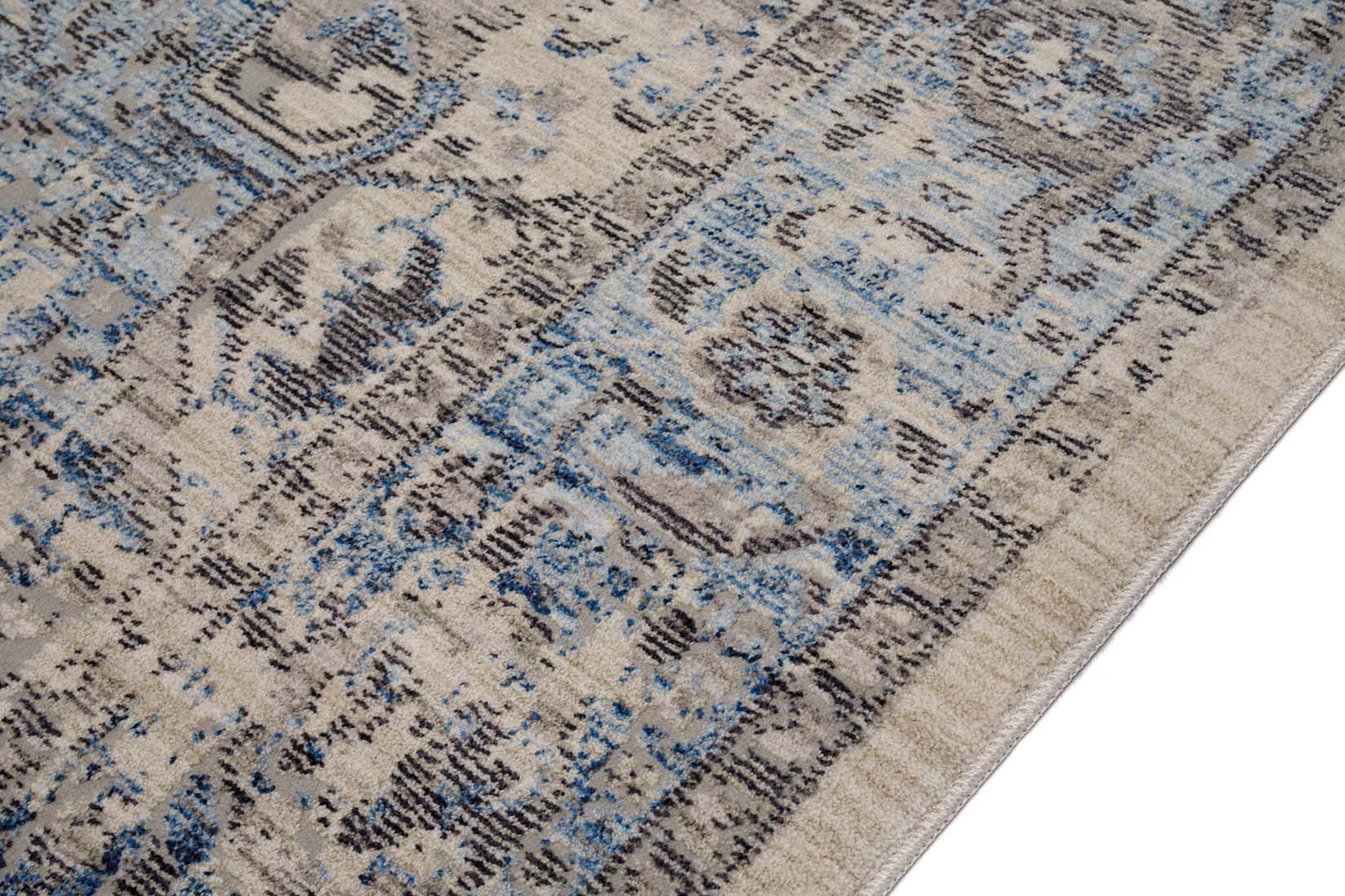 Persian style area rug in blue and grey