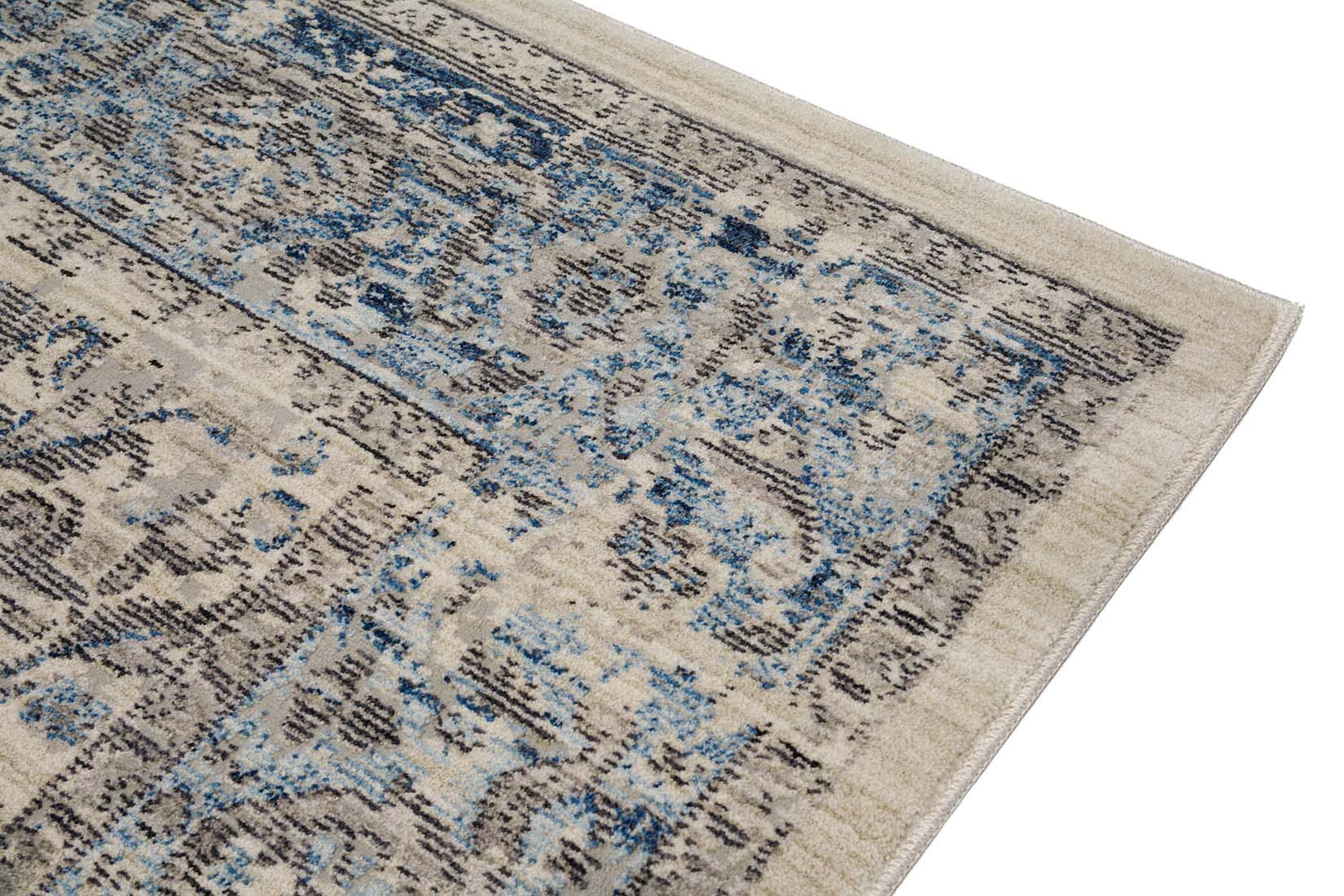 Persian style area rug in blue and grey