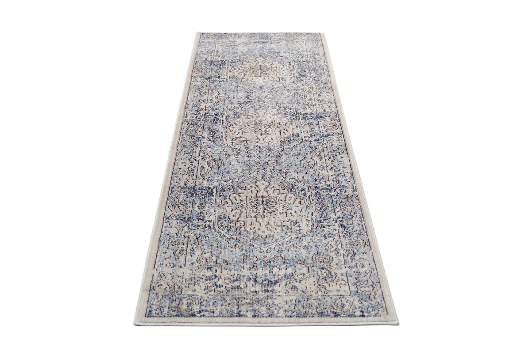 Persian style area rug in blue and grey