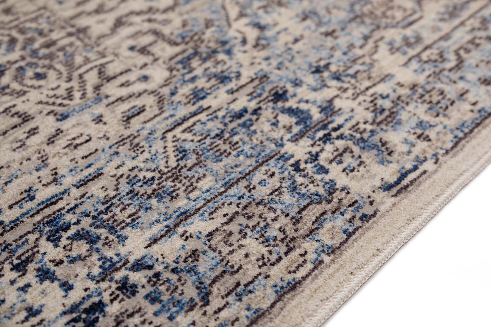 Persian style area rug in blue and grey