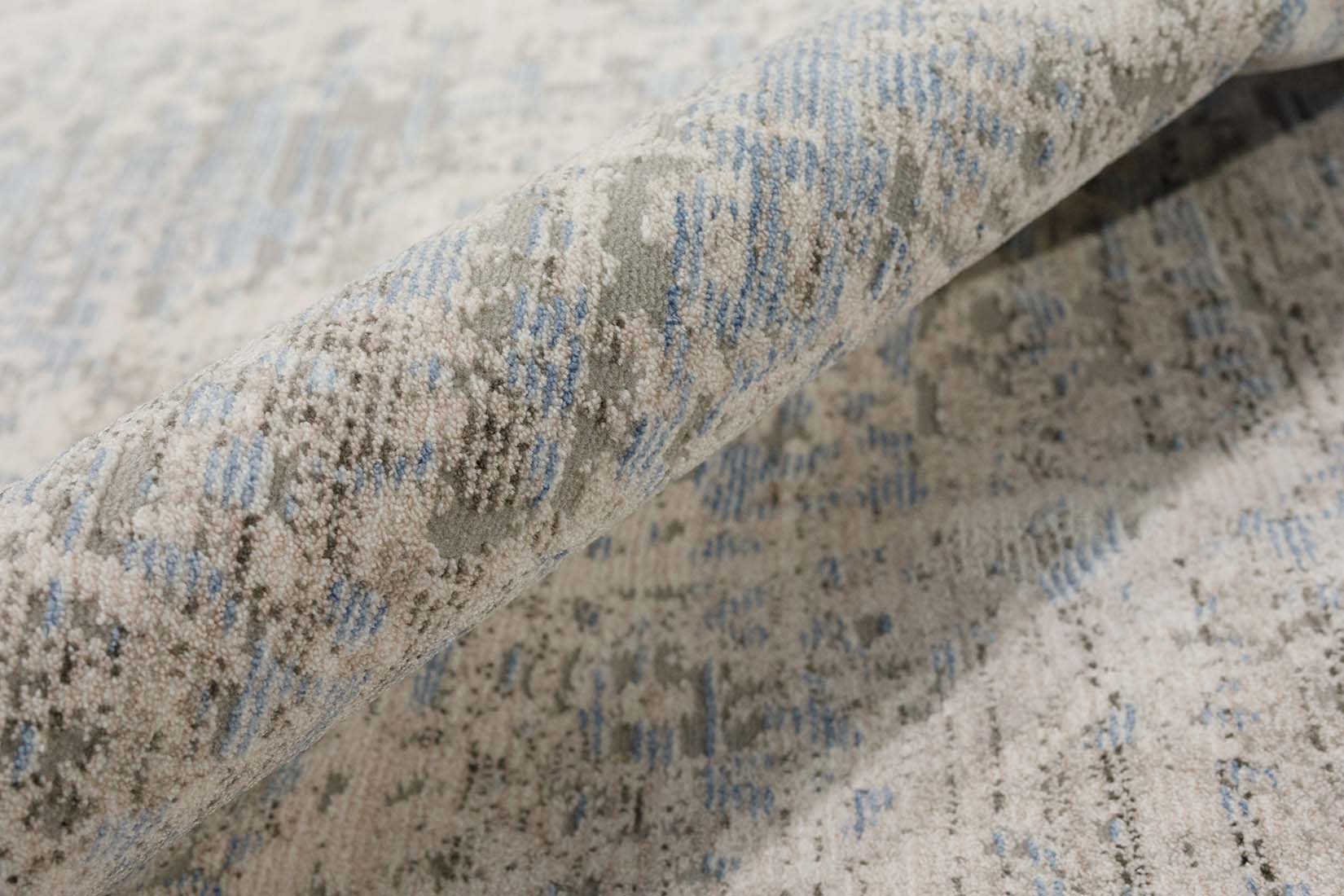 Persian style area rug in blue and grey