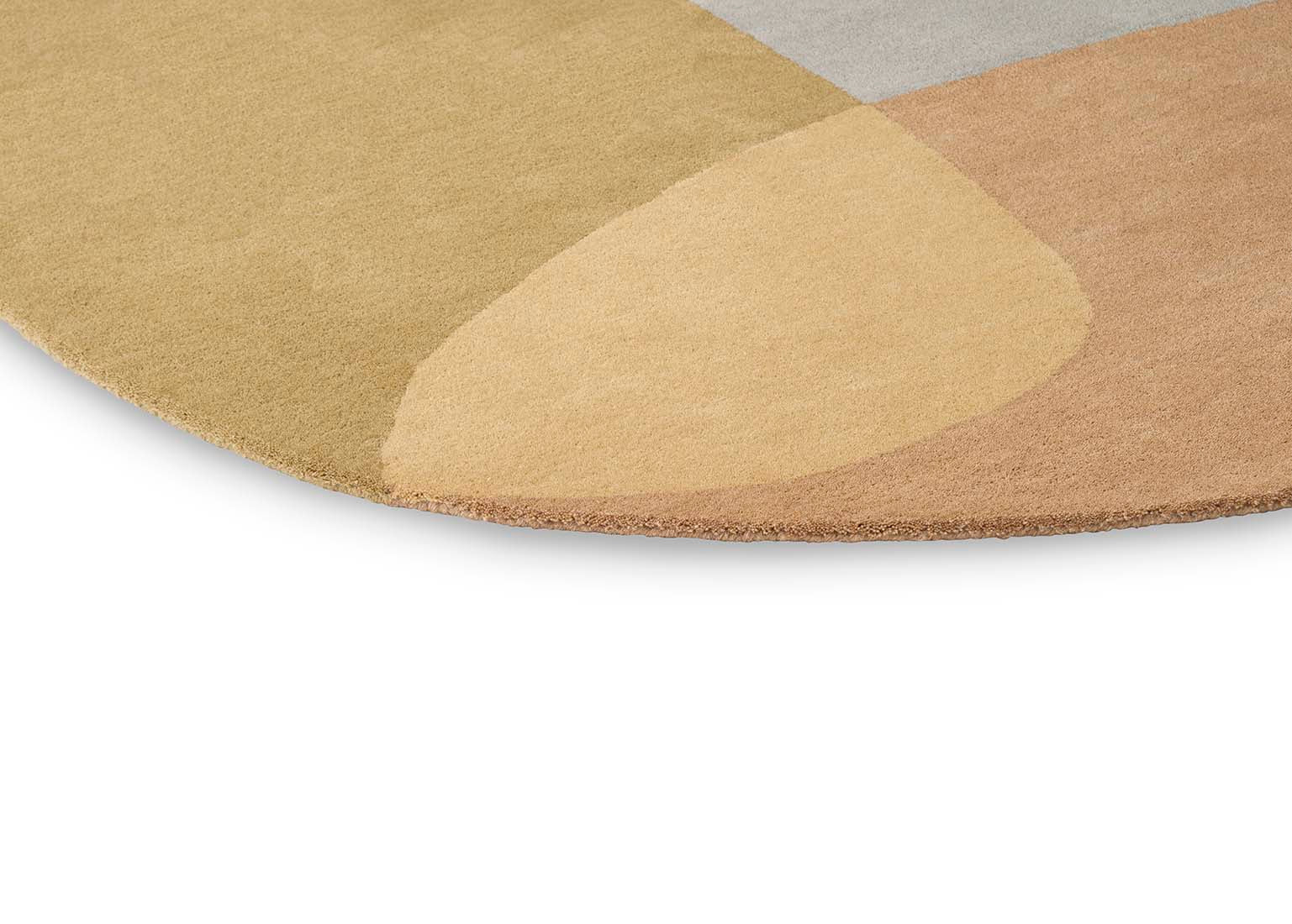 multicolour oval shaped wool rug with abstract design